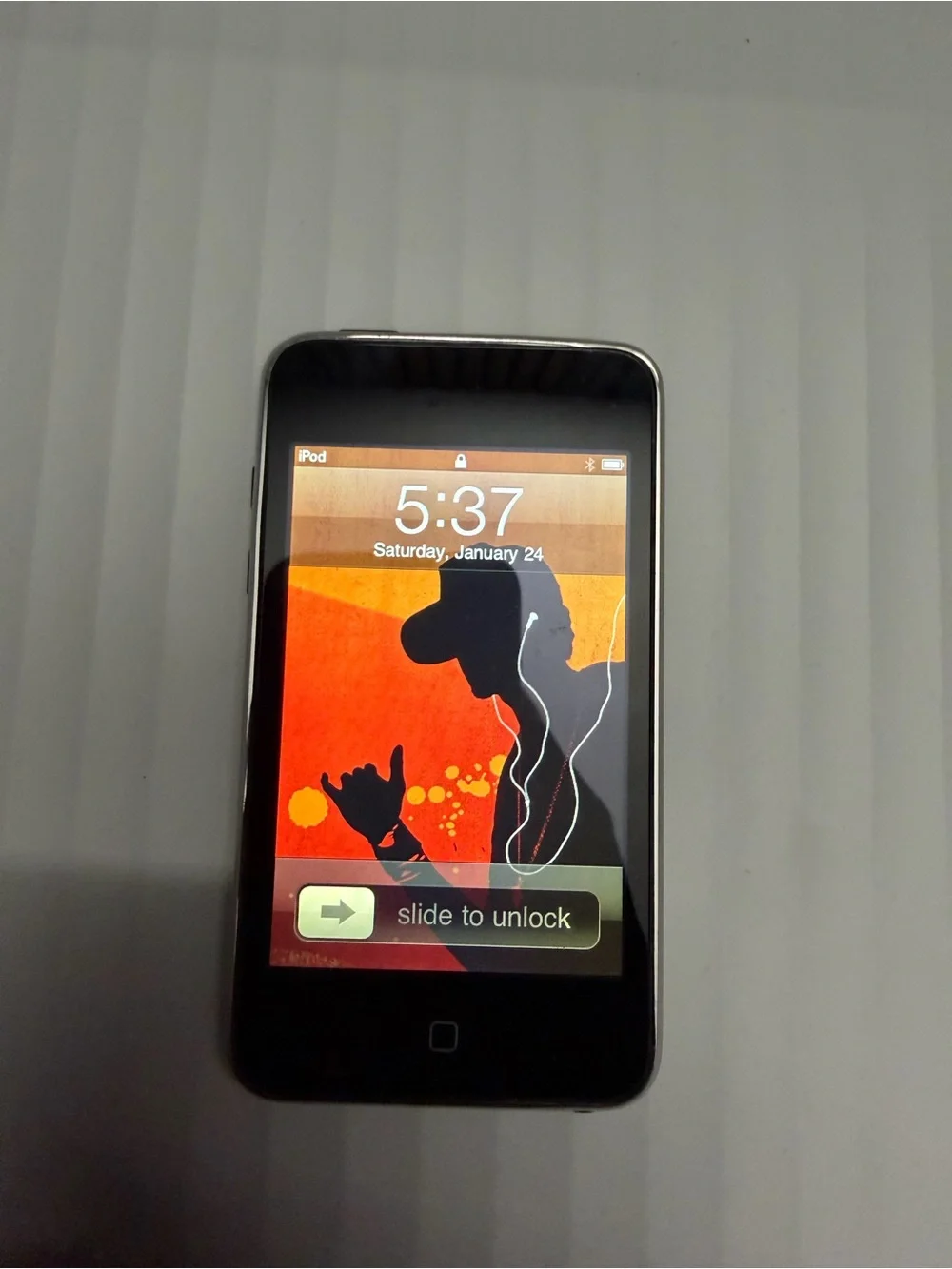 Apple iPod Touch Black with Colorful Orange Wallpaper